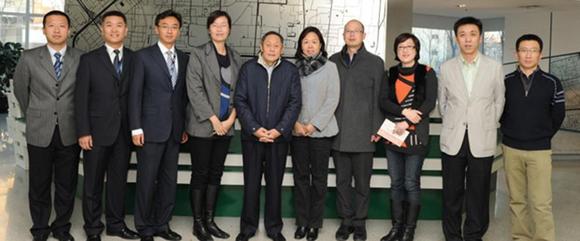 Liu Mingguang (fifth from left), Vice President of the China Post Group, visits the arvato service center currently under construction in Guangzhou