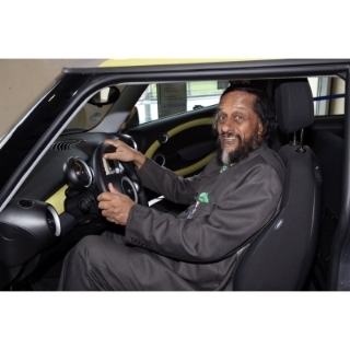 Emission free and still fun to drive: Nobel Laureate and Chairman of the UN IPCC (International Panel on Climate Change) Dr Rajendra Pachauri behind the whell of the all electric MINI E