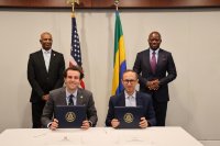 Millennial Potash Corp. signing ceremony with Chairman Farhad Abasov (seated), DFC Head of Investments and Chief of Staff Conor Coleman (seated), President of Gabon His Excellency Brice Oligui Nguema (standing right), and DFC Acting CEO Dev Jagadesan (standing left) Millennial Potash Corp. signing ceremony with Chairman Farhad Abasov (seated), DFC Head of Investments and Chief of Staff Conor Coleman (seated), President of Gabon His Excellency Brice Oligui Nguema (standing right), and DFC Acting CEO Dev Jagadesan (standing left)