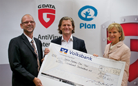 G Data Software AG: Scheckübergabe an Plan International Deutschland e.V.