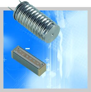 Two versions of the PICMA® piezo actuator (5x5x18 mm): Conventional multilayer actuator and with stainless steel casing for a hermetic seal and additional moisture protection
