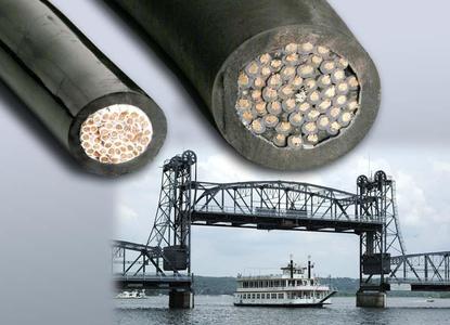 Slimmer profile of cable insulated with DuPont(TM) Hytrel® (at left) indicates longer flex life than rubber-insulated cable (at right) that failed after less than two years of service on lift bridge