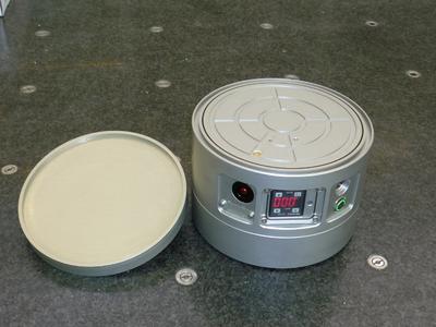 Vacuum chuck upside down with protective cover removed