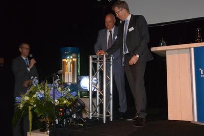 symbolischer Startknopf