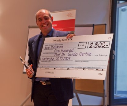 Prof.Dr. Guido Gentile erhielt den ersten Preis beim PTV Scientific Award.jpg